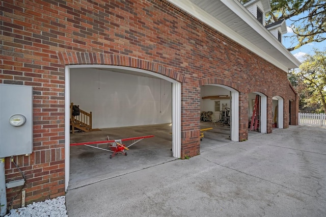 garage featuring fence