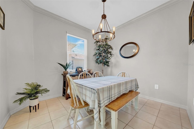 dining room featuring crown molding, light tile patterned flooring, baseboards, and a chandelier