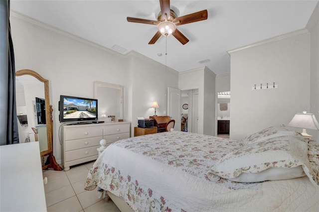 bedroom with visible vents, connected bathroom, ceiling fan, ornamental molding, and light tile patterned flooring