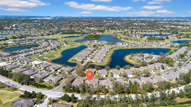 aerial view with a residential view and a water view