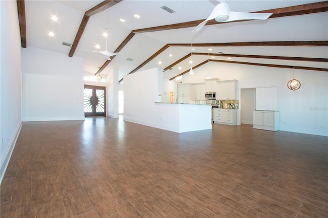 unfurnished living room featuring beam ceiling, visible vents, ceiling fan, and dark wood-style flooring