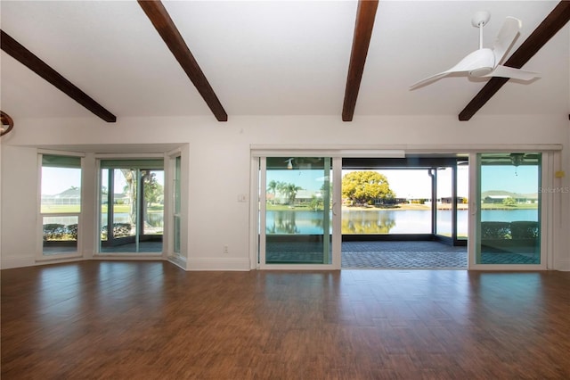 empty room with baseboards, a water view, wood finished floors, and a ceiling fan