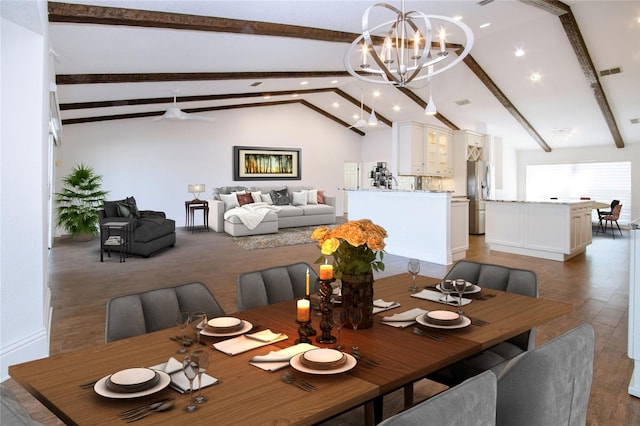 dining area featuring recessed lighting, visible vents, an inviting chandelier, and vaulted ceiling with beams