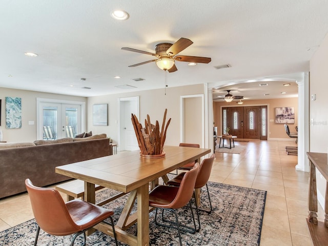 dining area with visible vents, ornate columns, light tile patterned flooring, recessed lighting, and french doors