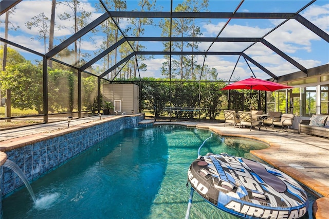 pool featuring a storage shed, an outbuilding, a lanai, and a patio