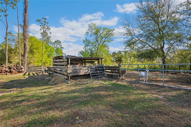 view of yard with an exterior structure and an outdoor structure