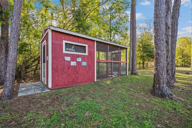 view of outbuilding with an outbuilding