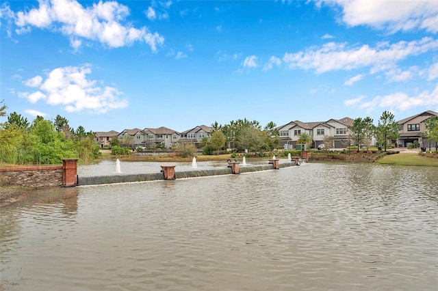 view of water feature with a residential view