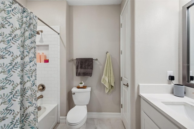 bathroom featuring vanity, toilet, shower / bathtub combination with curtain, and baseboards