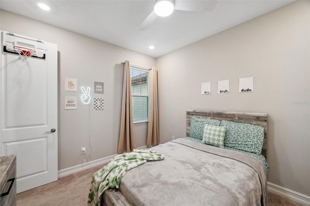 carpeted bedroom featuring recessed lighting, baseboards, and a ceiling fan