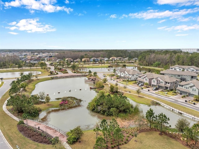 birds eye view of property featuring a residential view and a water view