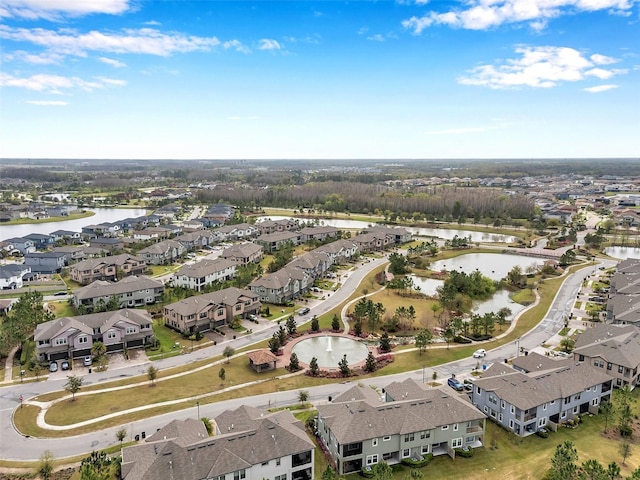 aerial view featuring a residential view and a water view