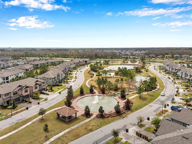 birds eye view of property with a residential view