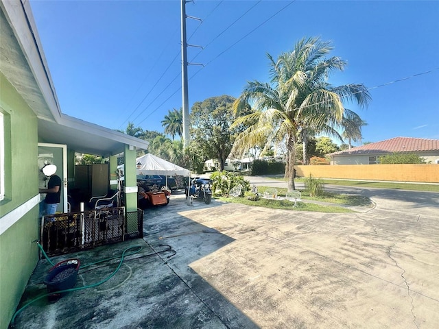 view of yard with a patio area and fence