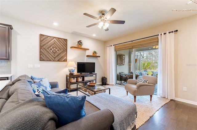 living room featuring recessed lighting, ceiling fan, baseboards, and wood finished floors