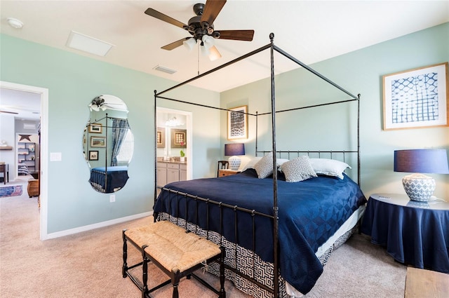 bedroom featuring visible vents, connected bathroom, baseboards, carpet, and ceiling fan