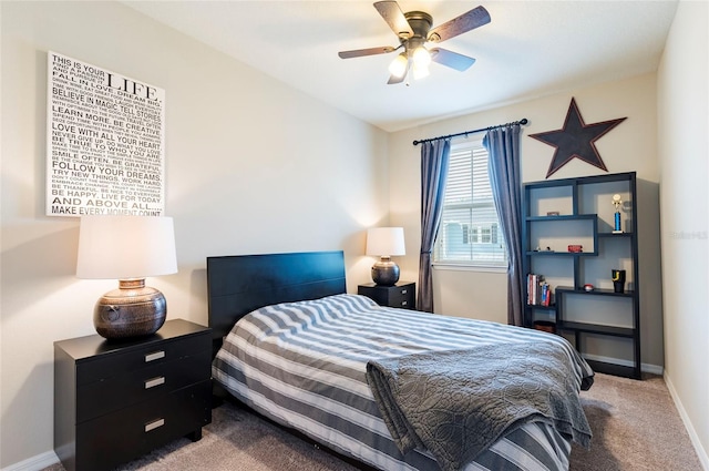 bedroom featuring baseboards, carpet floors, and ceiling fan