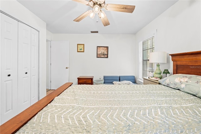 bedroom featuring a closet, visible vents, and ceiling fan