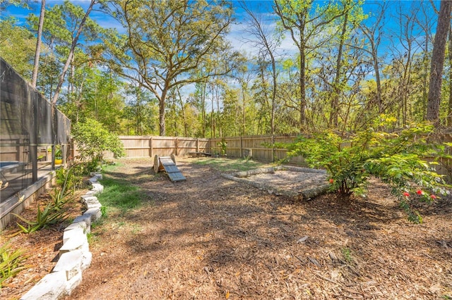 view of yard featuring a fenced backyard