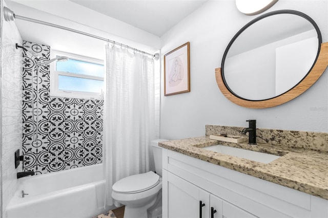 bathroom featuring vanity, toilet, and shower / bath combo with shower curtain