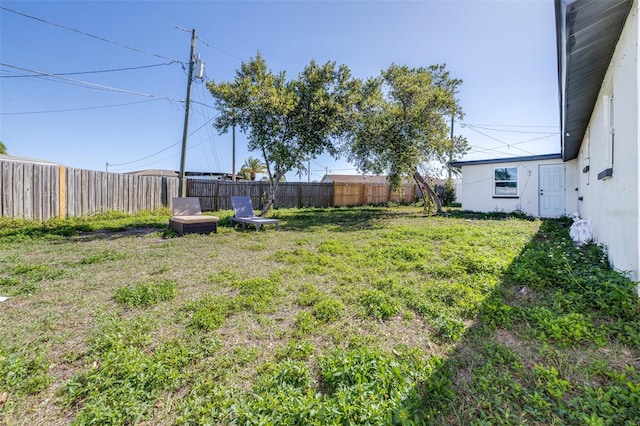 view of yard featuring a fenced backyard