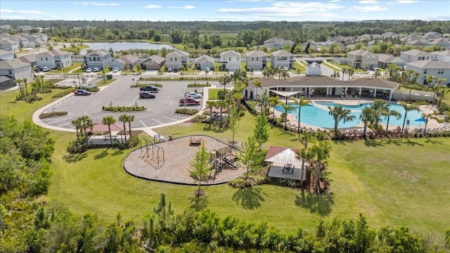 33064 Tulip Petal Ln, Wesley Chapel, FL 33545 - aerial perspective of suburban area featuring a pool area and a nearby body of water