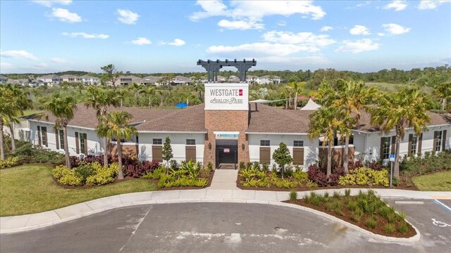 33064 Tulip Petal Ln, Wesley Chapel, FL 33545 - view of building exterior with a residential view