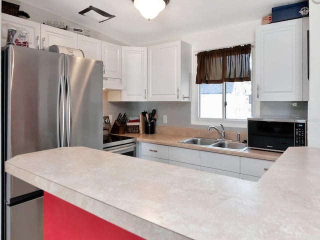 kitchen featuring stainless steel appliances, a sink, light countertops, under cabinet range hood, and white cabinetry