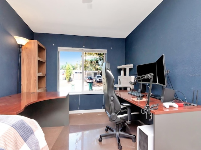 office space with concrete flooring