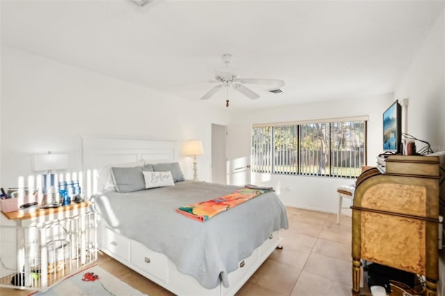 bedroom with ceiling fan, visible vents, and light tile patterned flooring