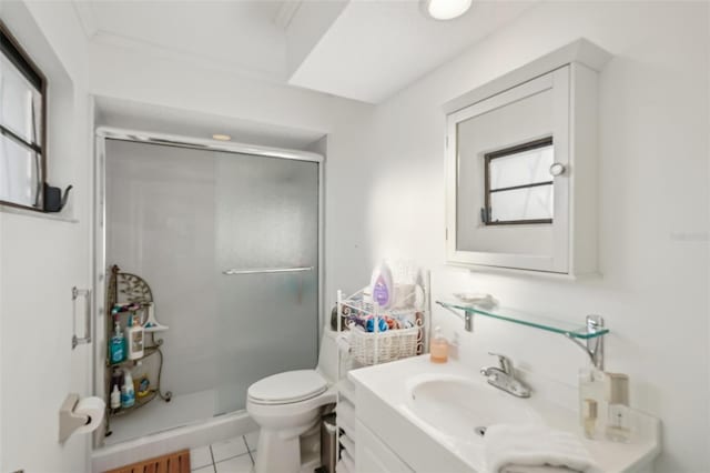 full bath featuring vanity, toilet, a shower stall, and tile patterned flooring