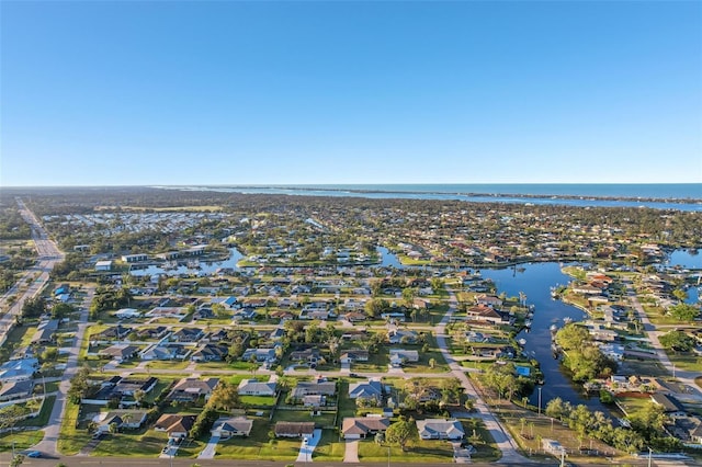 bird's eye view featuring a residential view and a water view