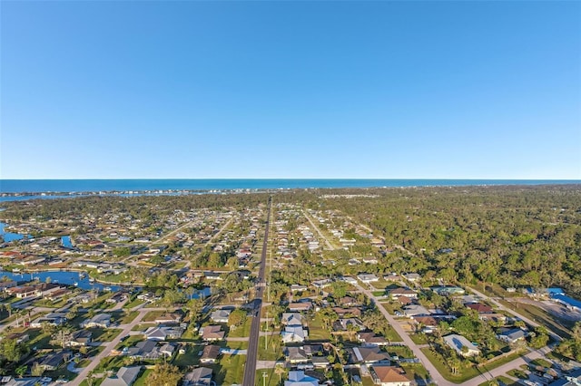 aerial view featuring a water view and a residential view