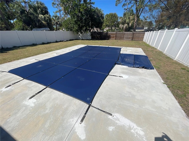 645 38th Ave S, Saint Petersburg, FL 33705 - view of pool with a yard and a fenced backyard