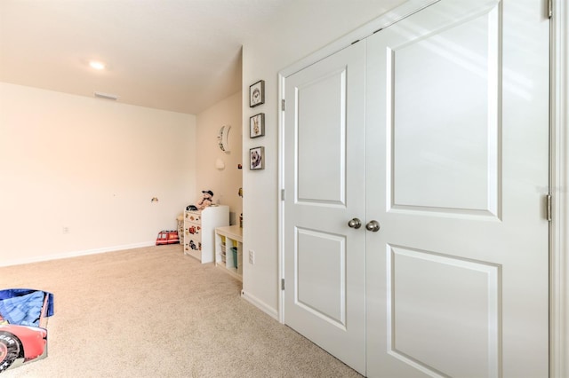 game room with carpet, visible vents, and baseboards