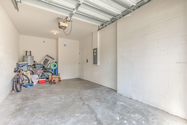 garage with electric panel, electric water heater, and a garage door opener