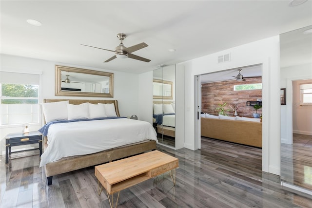 bedroom featuring visible vents, recessed lighting, a ceiling fan, and wood finished floors