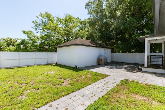 view of yard featuring a patio and a fenced backyard