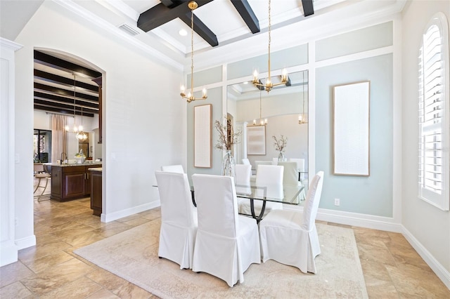 dining space featuring an inviting chandelier, baseboards, coffered ceiling, and beam ceiling