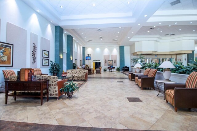 1020 New Winsor Loop Unit 46, Sun City Center, FL 33573 - community lobby with a towering ceiling and recessed lighting