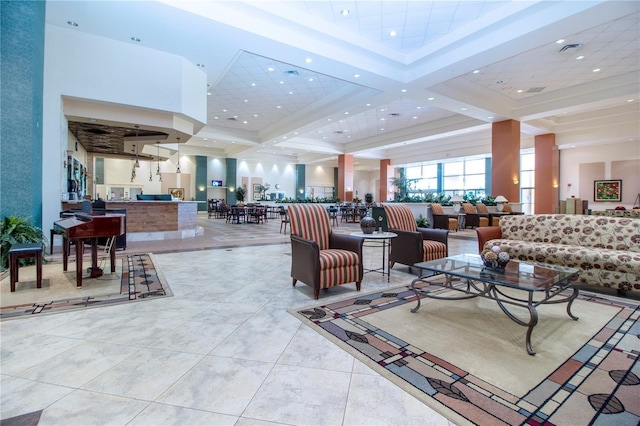 1020 New Winsor Loop Unit 46, Sun City Center, FL 33573 - building lobby with recessed lighting, beam ceiling, and a towering ceiling