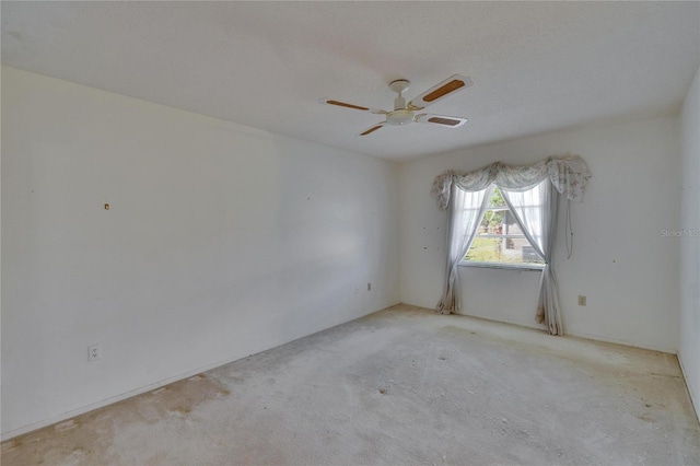 unfurnished room featuring a ceiling fan