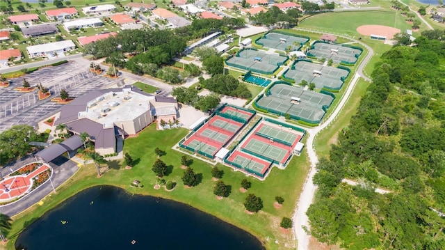 aerial view featuring a residential view and a water view