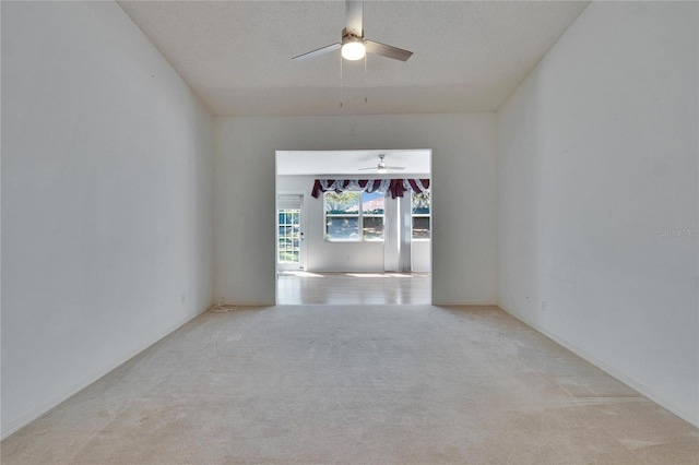 1034 Mcdaniel St Unit 1034, Sun City Center, FL 33573 - spare room featuring ceiling fan and carpet flooring