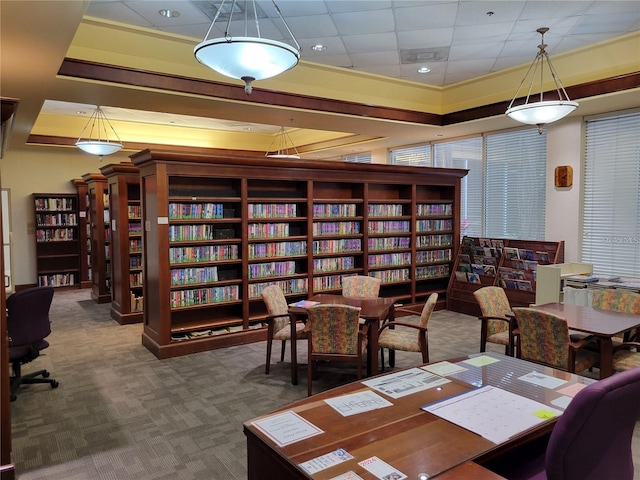 1034 Mcdaniel St Unit 1034, Sun City Center, FL 33573 - interior space featuring bookshelves, visible vents, and a raised ceiling