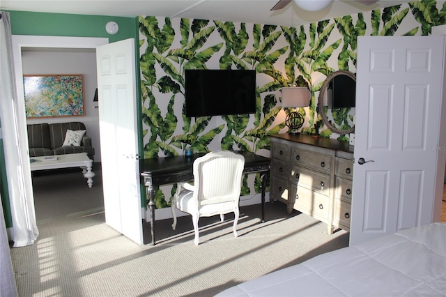 bedroom with wallpapered walls