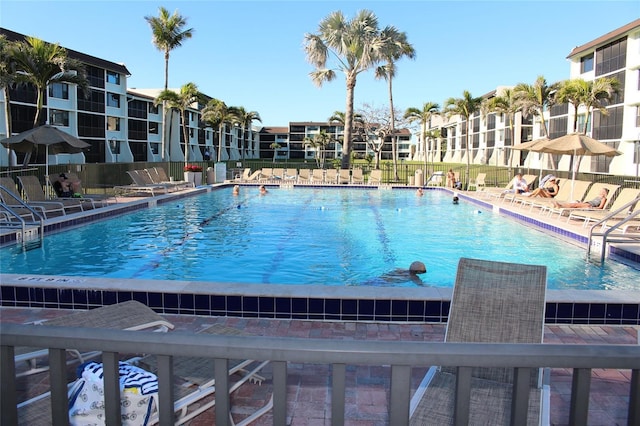 979 E Gulf Dr Unit D402, Sanibel, FL 33957 - community pool featuring fence and a residential view