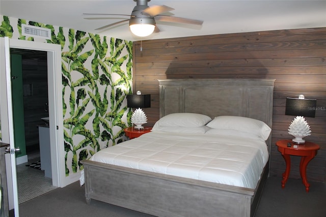 979 E Gulf Dr Unit D402, Sanibel, FL 33957 - carpeted bedroom with visible vents, wood walls, and ceiling fan