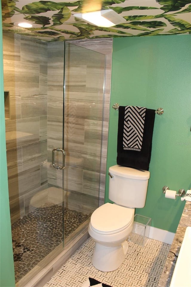 979 E Gulf Dr Unit D402, Sanibel, FL 33957 - full bath with a stall shower, tile patterned floors, and toilet
