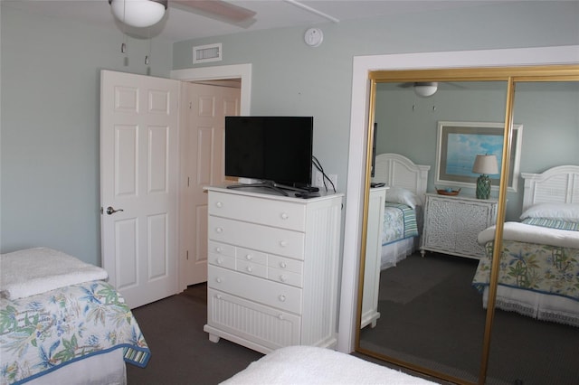 979 E Gulf Dr Unit D402, Sanibel, FL 33957 - bedroom featuring dark carpet, a ceiling fan, visible vents, and a closet